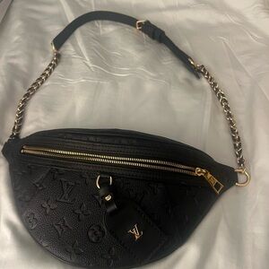 Elegant Black Crossbody Bag with Gold Details